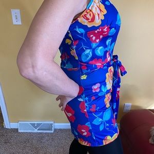 NEW. One piece sleeveless, V-neck jumper.